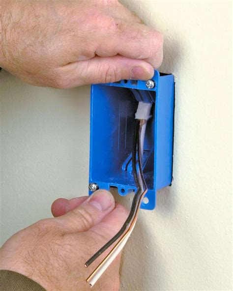 attaching electrical outlet box for light into wall|diy electrical box installation.